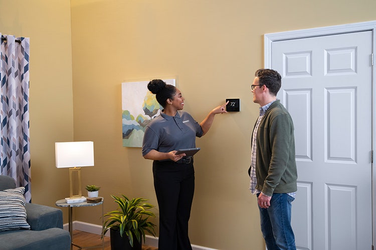 tempstar-dealer-telling-homeowner-about-brand-reliability